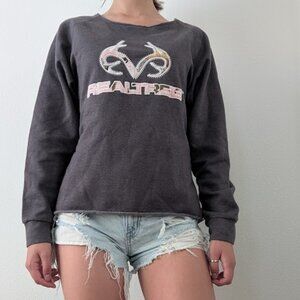 gray cropped realtree sweatshirt with graphic logo